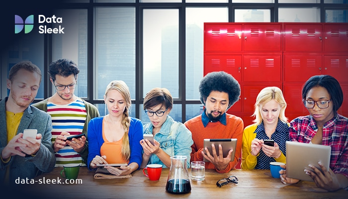 How to create a data strategy (How to start data strategy) - Team Around a Table & All are focused on Different Devices